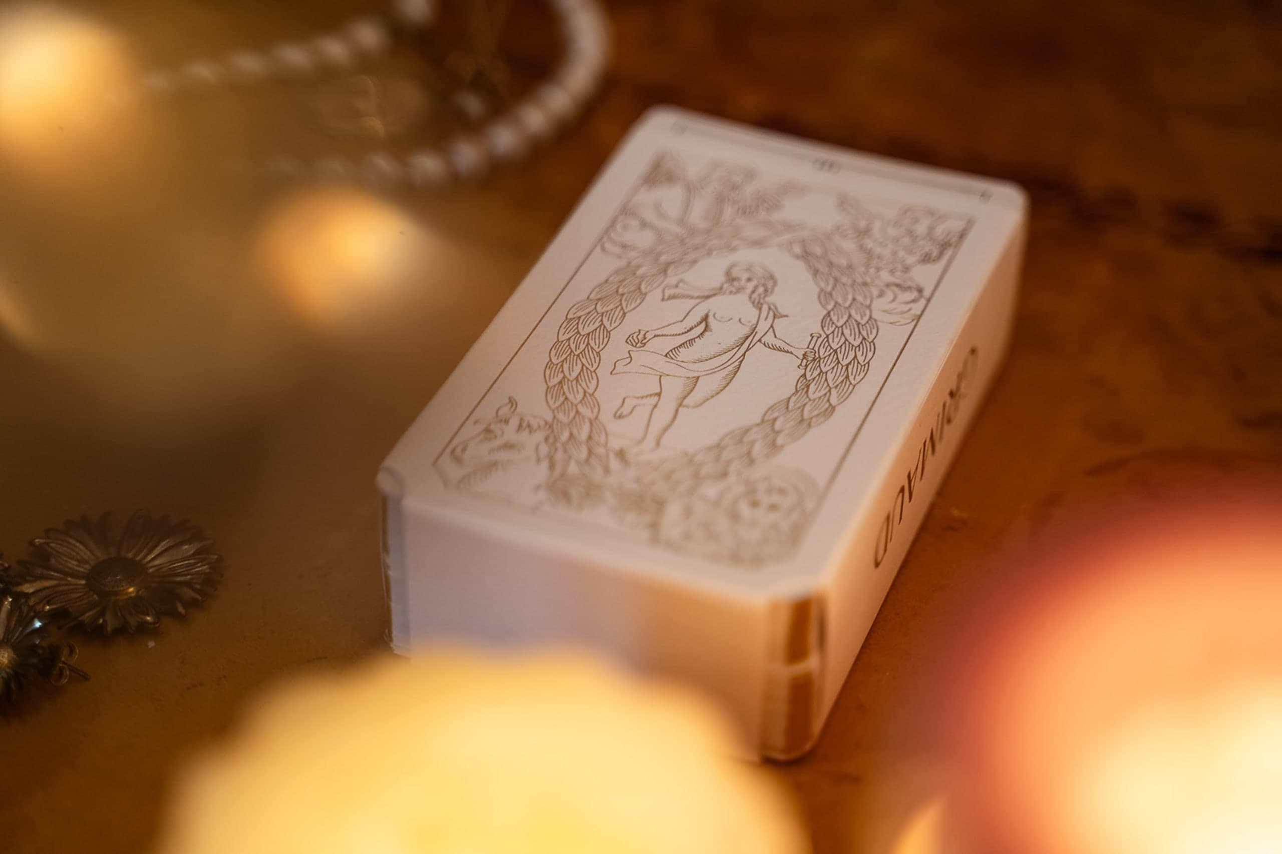Tarot de Marseille illustrated box packaging on a table