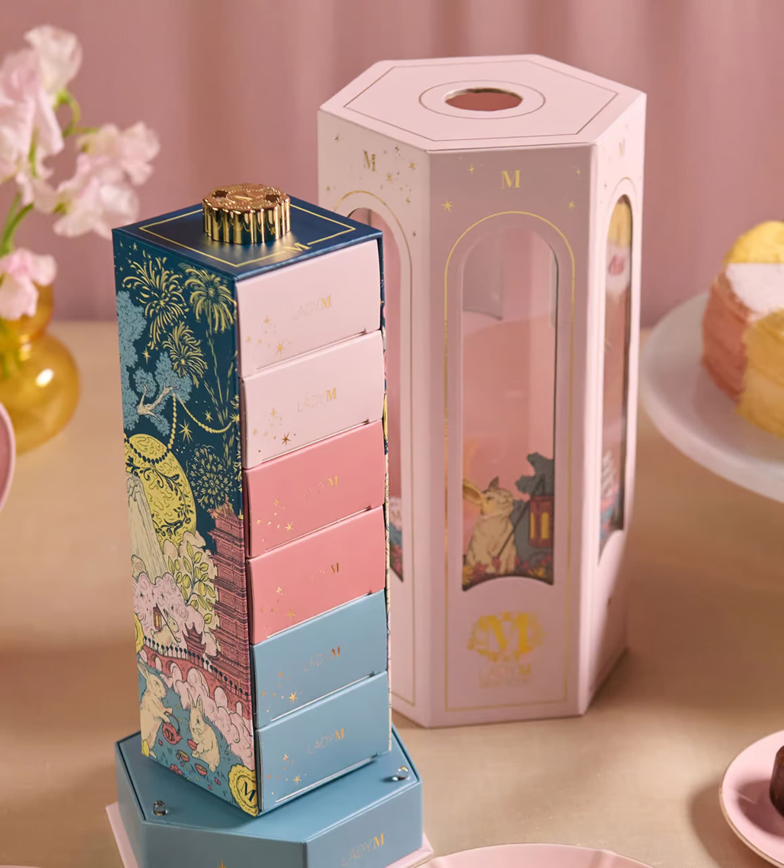 Mid-Autumn hexagonal lantern packaging for Lady M by Swindler & Swindler — Legend of the Jade Rabbit, seamless fine line illustration in navy and blush colourways.